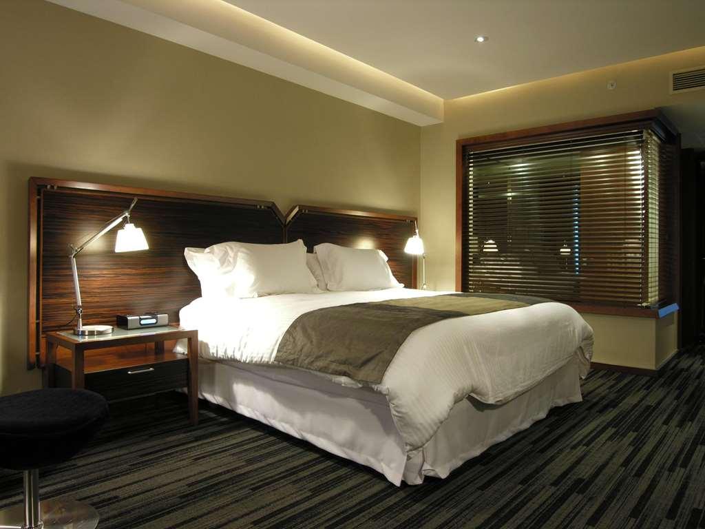Hotel Dreams Valdivia Cameră foto A bedroom