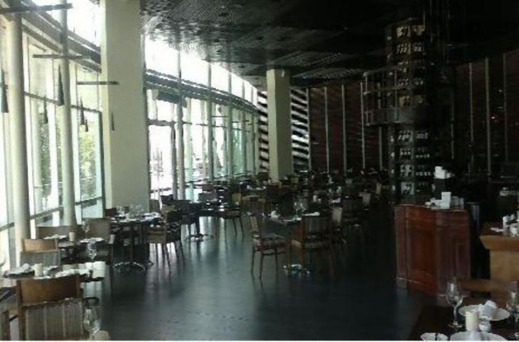 Hotel Dreams Valdivia Exterior foto The interior of the restaurant